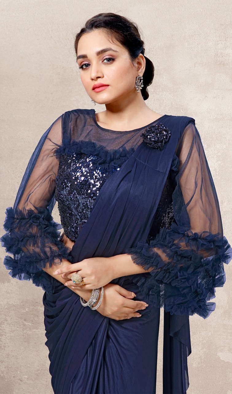 amoha trendz Design No 1015601 Imported Lycra catchy look saree catalog
